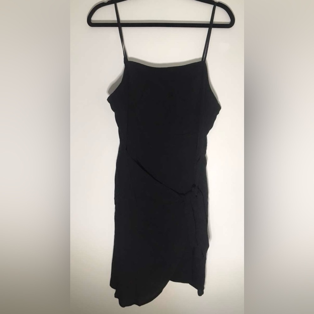 Forever 21 little black dress with spaghetti straps and bow in front